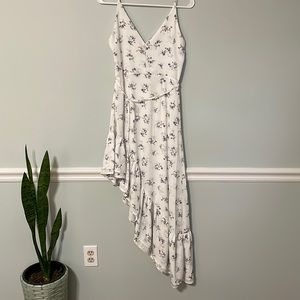 Asymmetrical white floral size small dress.